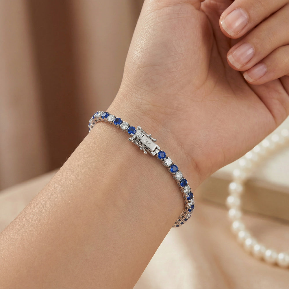 14KW PREC COLOR 4 PRONG TENNIS BRACELET