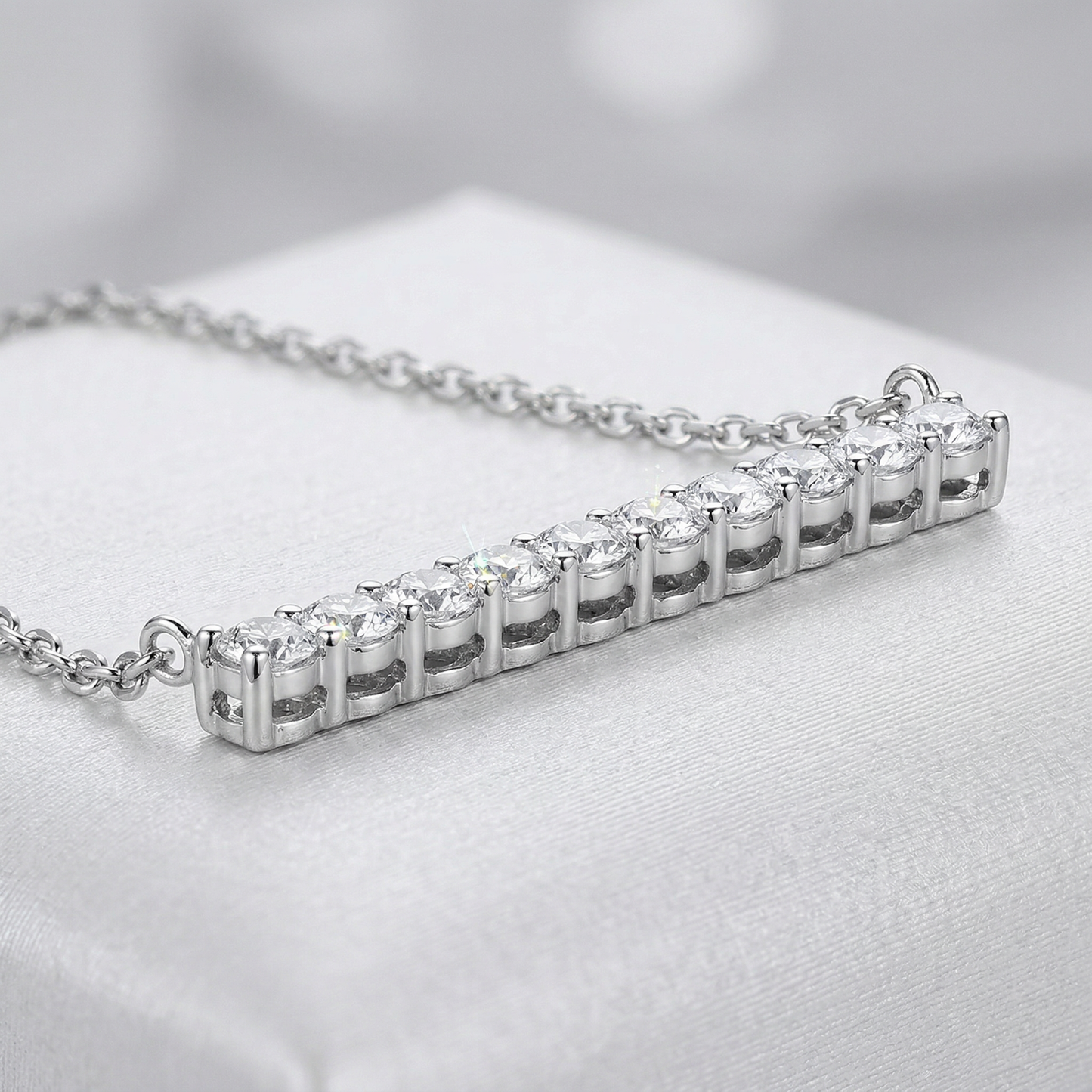 14KW DIAMOND PRONG SET BAR NECK